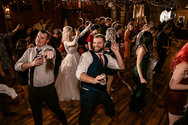 people dancing at a wedding